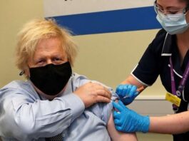 Boris Johnson, the Prime Minister of the United Kingdom, receives the first dose of the AstraZeneca COVID-19 vaccine.