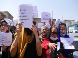 Hundreds of people demonstrate in front of the United Nations offices in New York, protesting infringement of women's rights in Afghanistan.