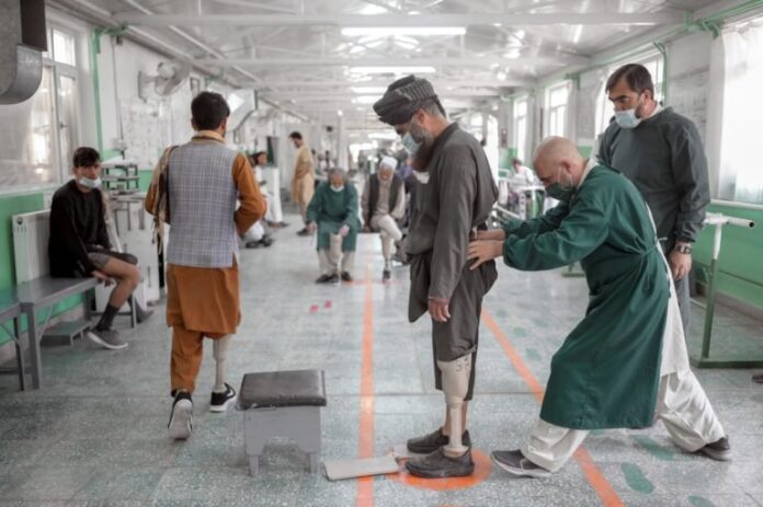 Afghan amputees are regaining mobility alongside former adversaries.