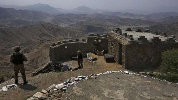 Two Pakistani troops have been killed in a militant strike near the Afghan border.