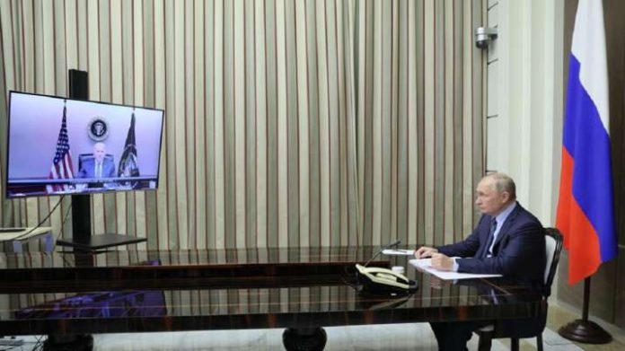 Joe Biden threatens Putin with military aid if Russia invades Ukraine during a two-hour virtual chat Joe Biden threatens Putin with military aid if Russia invades Ukraine during a two-hour virtual chat