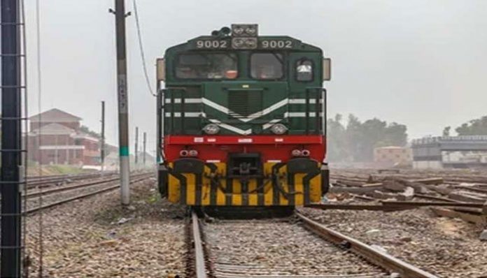 In Pakistan, a train driver gets off to buy yoghurt. Suspended