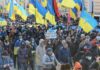 Thousands of people march through the streets of Ukraine's second largest city amid tensions with Russia