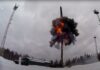 As Putin oversees nuclear drills, the US says that Russia is 'getting ready to strike' Ukraine