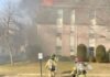 To escape a building fire, Dad throws his baby out the window and jumps after him
