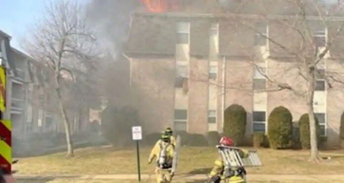 dad To escape a building fire, Dad throws his baby out the window and jumps after him
