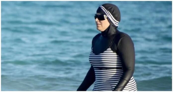 Unacceptable, French government, burkinis, to ban 'burkinis', swimming pools, symbol of Islamisation,Alpine city of Grenoble, Muslim women, The interior minister of France