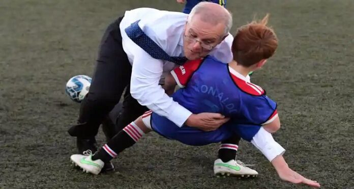 pm friendly soccer match, Australia's Prime Minister Barrels, Barrels Into a Child, Politicians, Prime Minister, Scott Morrison, Red card