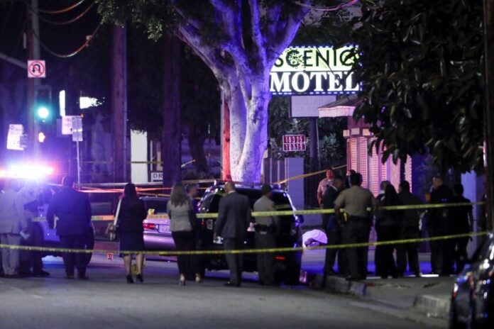 Two Los Angeles police officers were shot and murdered in a Los Angeles suburb Two Los Angeles police officers were shot and murdered in a Los Angeles suburb