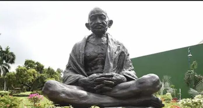 gandhi Indian Americans, Americans demonstrate, vandalization of the Gandhi statue, Time Square, Biden administration