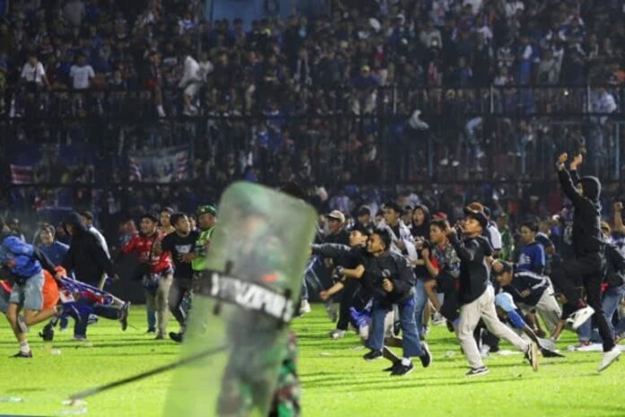 After a stampede to exit an Indonesian soccer match, 129 people killed After a stampede to exit an Indonesian soccer match, 129 people killed