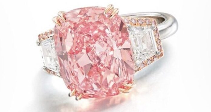 Hong Kong auction, a rare pink diamond, record-breaking $57.7 million, diamond sells