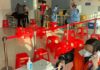 As cases of COVID rise, Chinese cities are giving away fever medications
