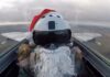 Watch as a Ukrainian fighter pilot dressed as Santa launches missiles against Russian targets