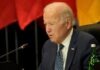 Joe Biden has a heated exchange with a reporter about not attending Pope Benedict's funeral