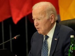 Joe Biden has a heated exchange with a reporter about not attending Pope Benedict's funeral