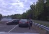A wild crash in the US saw an out-of-control car almost hit an officer